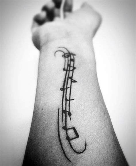 50 Amazing Music Staff Tattoo Designs for Men