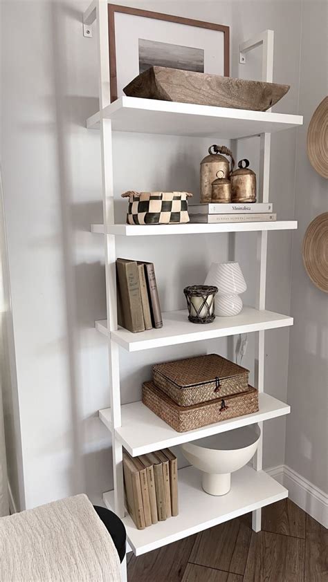 White ladder shelf styled with neutral decor pieces Home Décor, Boho ...