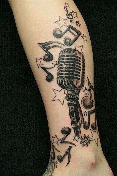 Beautiful Girls Music Tattoo Design on Leg for 2011 - YusraBlog.com