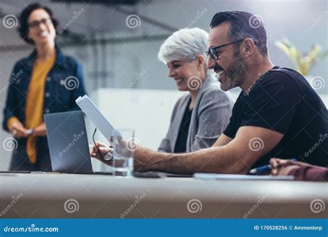 Happy Business People in a Meeting Stock Photo - Image of brainstorming ...