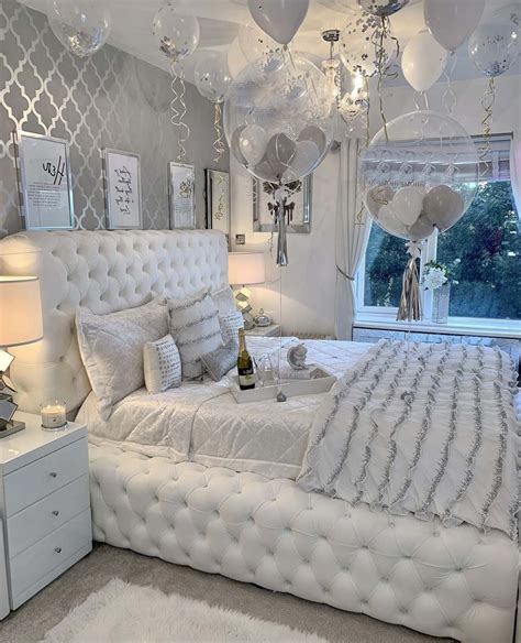 All white Christmas bedroom decor with white bed with crystal buttons ...