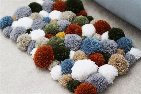 DIY Yarn Pom Pom Rug • Sewrella