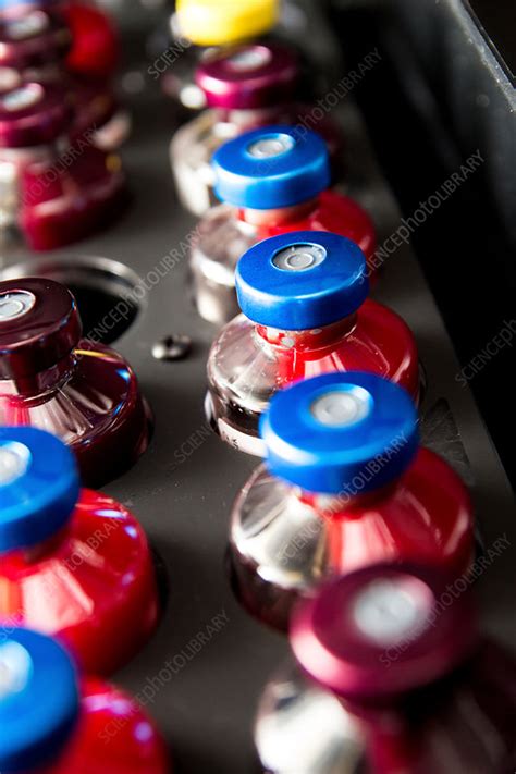 Blood culture bottles being analysed - Stock Image - C036/6663 ...