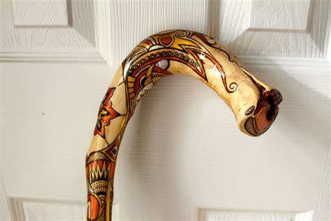 Handmade one of a kind wooden walking cane with wood burned