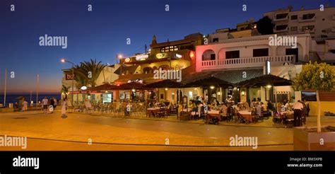 Portugal, The Algarve, Praia Do Carvoeiro, Restaurants At Dusk On The ...