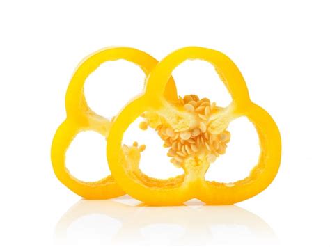 Premium Photo | Yellow pepper slices on white space