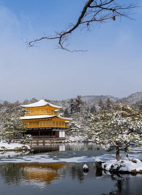 Premium Photo | Snowy kinkakuji temple in winter famous tourist ...