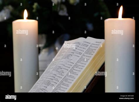 Open Bible With Candle