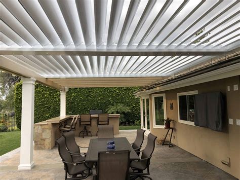 Equinox louvered & Maxxwood combination patio cover designs - Alumawood ...