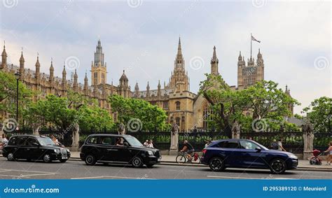 Typical black London cab editorial image. Image of streets - 295389120