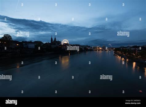 Basel Switzerland at night over the Rhine river Stock Photo - Alamy