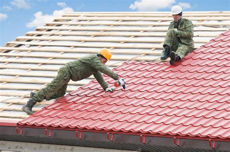 Roofing work with metal tile — Stock Photo © kalinovsky #5419379