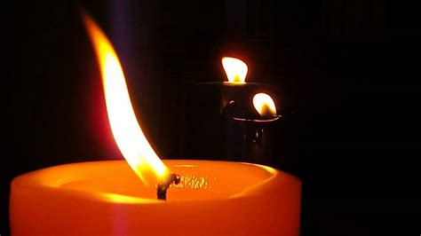 Flickering Candles Burning in the Night With Music From A Piano ...