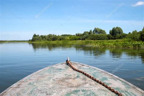 Boat floats on the water — Stock Photo © jenoche #85024414