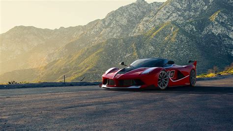 Red Ferrari On A Mountain Road | Super cars, Sports car, Car wallpapers