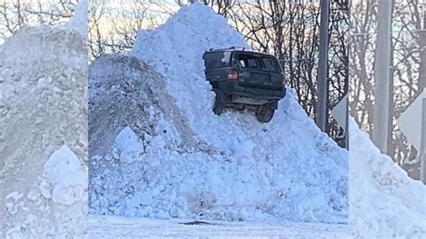 How Does a Vehicle Get Stuck That High in a Snow Bank