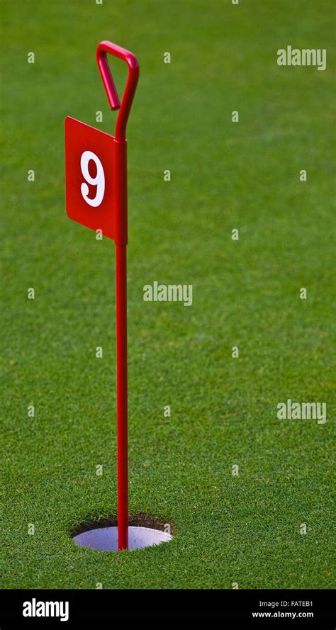 Golf Flag on Putting Green Stock Photo - Alamy