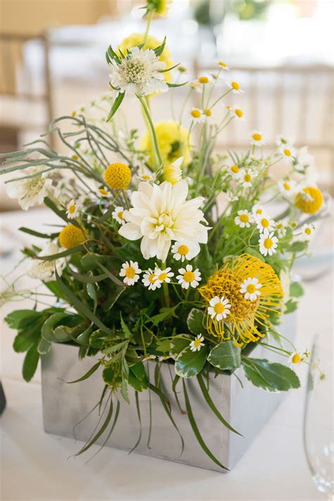 Green and yellow wedding centerpiece. Texture and free-form flowers ...