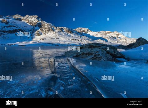 Sunrise at the Lago Bianco at the Berninapass, Canton of Grisons Stock ...