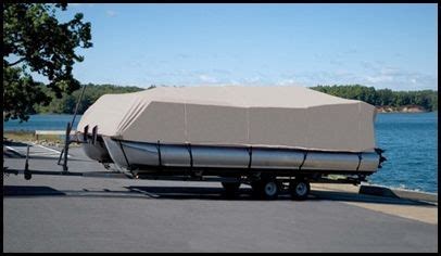 a boat with a cover on the trailer