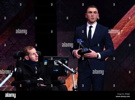 Kevin Sinfield holds his BBC Special Award alongside Rob Burrow during ...