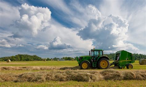 10 John Deere Loader Attachments to Simplify Hay Farming