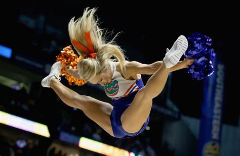 Gator cheerleader spread in the air : r/cheerleaders