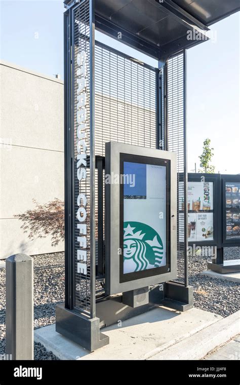 Starbucks drive-thru ordering stand Stock Photo - Alamy