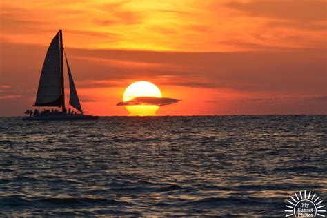 Clearwater Beach Sunset with Sailing Boat and Sun - My Sunset Photos