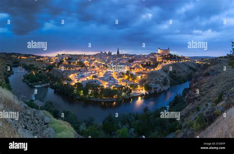 Panoramic view of Toledo after sunset, Spain Stock Photo - Alamy