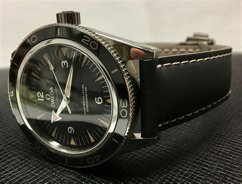 Omega Seamaster 300 on black rubber strap with Omega buckle. Omega ...