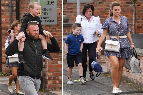 Wayne Rooney carries son Kit on his shoulder as he and Coleen enjoy ...