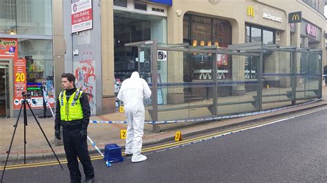 Man, 21, held after machete attack in front of terrified shoppers in ...