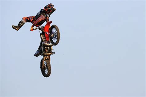 Dirt Bike Stunts - In The Air IX Photograph by Debbie Oppermann - Fine ...