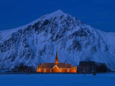 Lofoten, Norway - Stunning Church in Snowy Mountain Night Scene