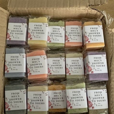 a box filled with lots of different colored soaps