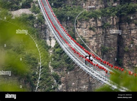 Aerial photos show the world's longest glass suspension bridge ...