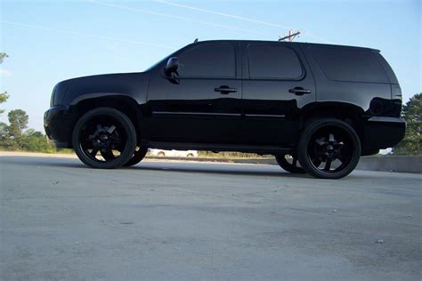 Blacked out Tahoe - wow. Have you seen the 2012/2013 Tahoe? www ...