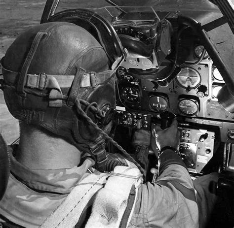 Pilot of a North American P-51 Mustang in cockpit | World War Photos