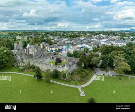 Aerial view of Cahir castle and town in Ireland with Tower House, outer ...