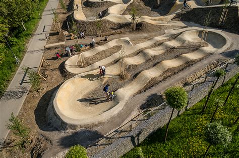 an aerial view of a skate park with ramps and ramps in the foreground ...