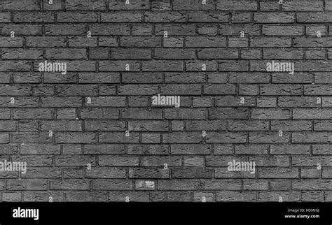 Background of black and white grey brick wall texture alone Stock Photo ...