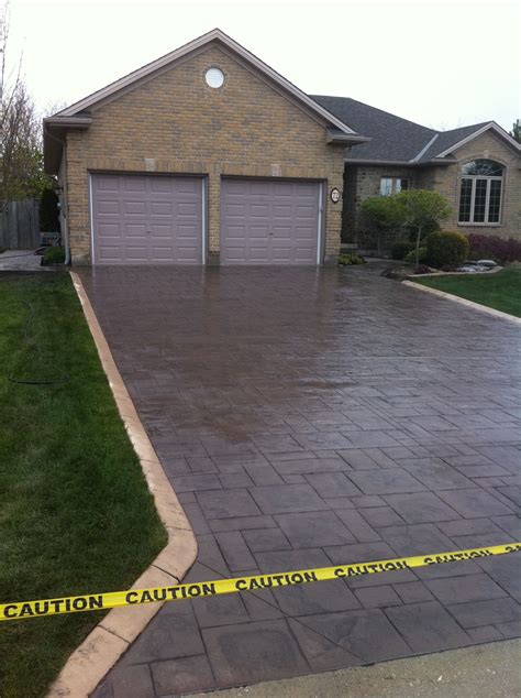 Grand Ashlar Slate Stamped Concrete Driveway in Kilworth Ontario ...