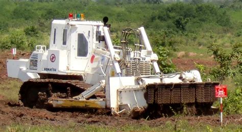 Komatsu Demining machine Completes Disposal of Landmines in Angola ...