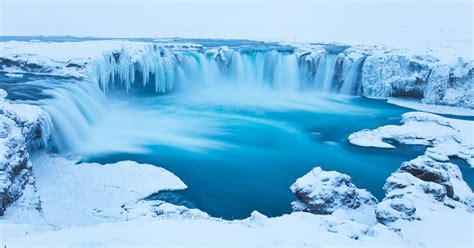 How to Explore the Frozen Waterfalls of Iceland