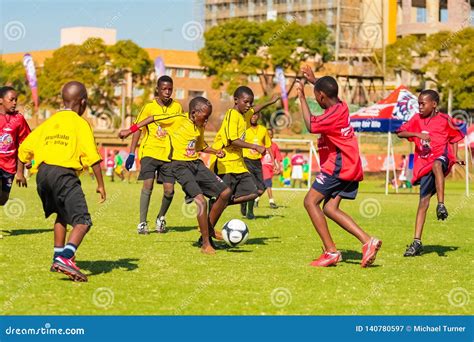 Diverse Children Playing Soccer Football at School Editorial ...