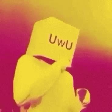 a person wearing a yellow mask with the word uwu written on it