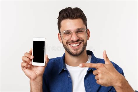 Young Man Showing His Brand New Smart Phone Isolated on White. Stock ...