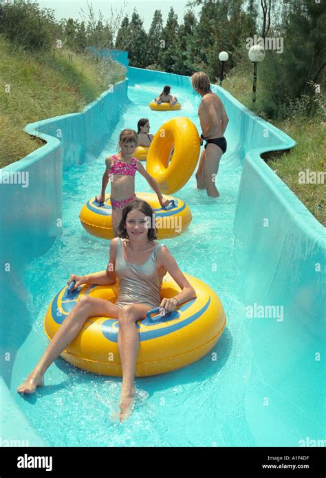 A girl on the water slide Stock Photo - Alamy