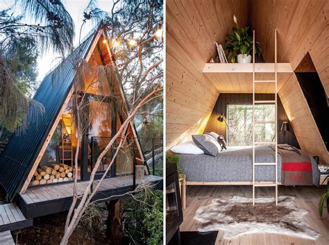 A Small Black A-Frame Cabin With A Wood Interior Was Designed As A ...